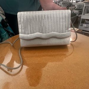 25% off listed price. Vintage hand clutch bag. For formal wear.